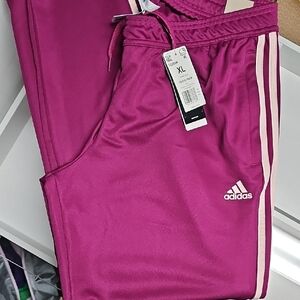 Adidas Purple Sweatpants with Three-Stripe Design